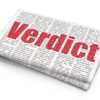 Law concept: Verdict on Newspaper background